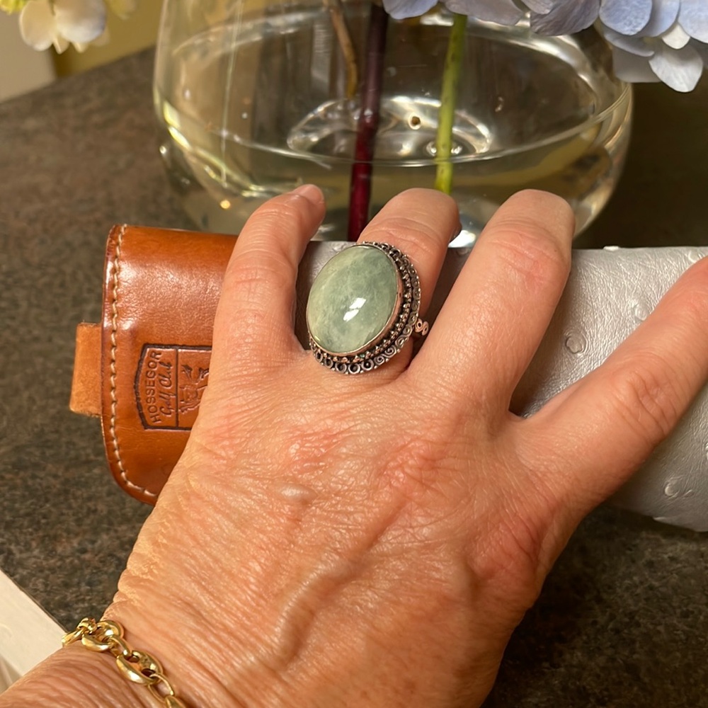 Sterling ring with large green stone, very summery and gorgeous with a tan.